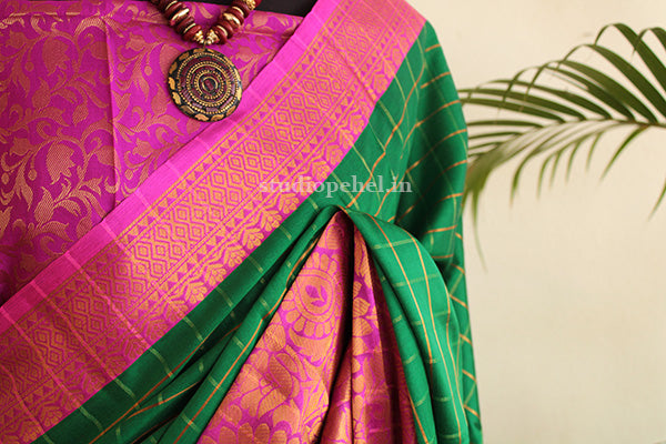 Green & pink silk blend checked saree