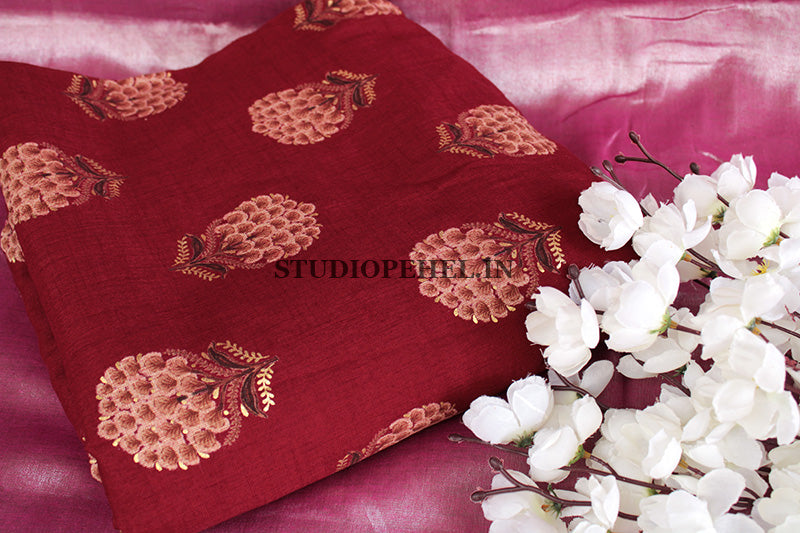 Reddish maroon foil print fabric