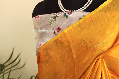 Golden yellow printed chiffon saree