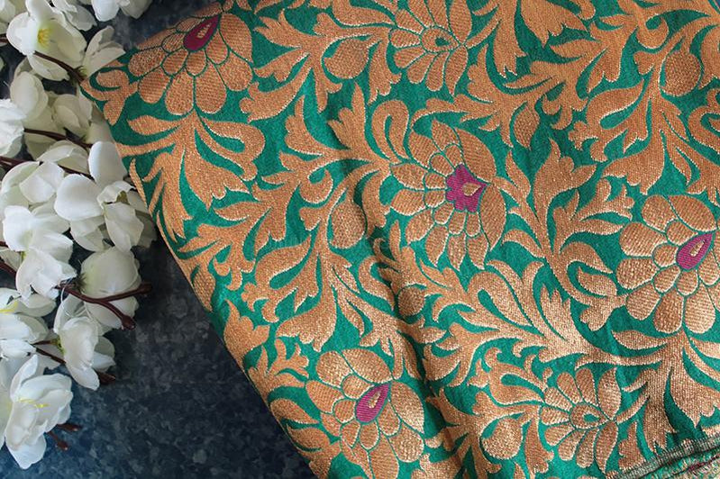 Teal green zari floral brocade fabric