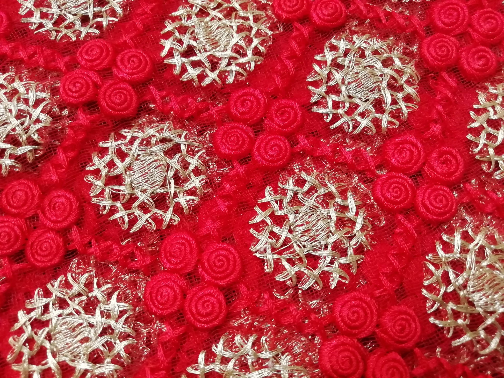 Laknaavi red Heavy embroidered net fabric - STUDIO PEHEL 
